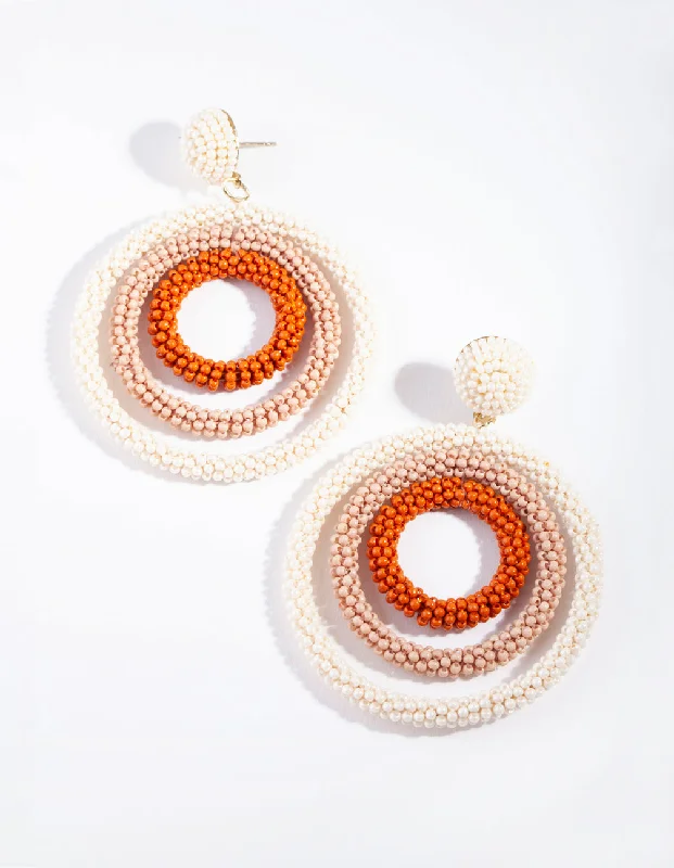 Affordable silver earrings for women-Neutral Beaded Triple Circle Drop Earrings