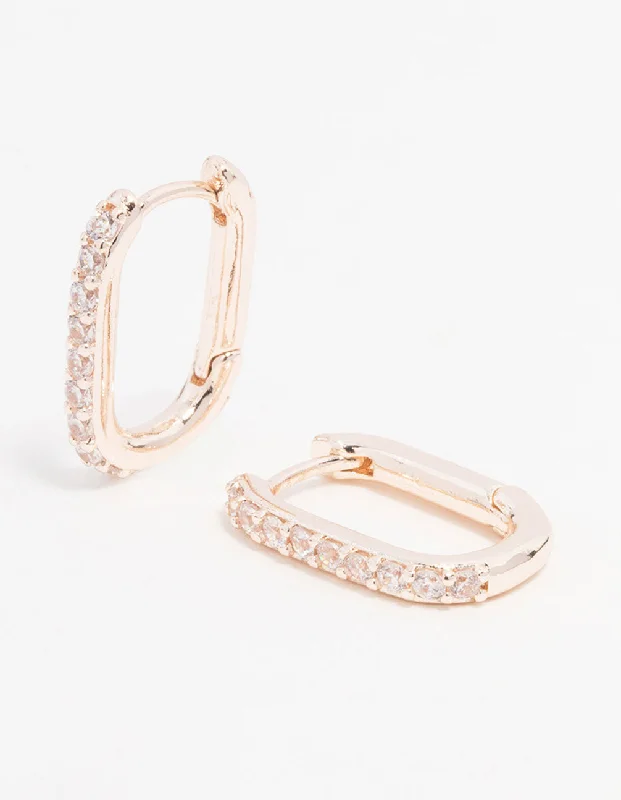 Simple earrings with diamonds-Rose Gold Plated Cubic Zirconia Pave Oval Hoop Earrings