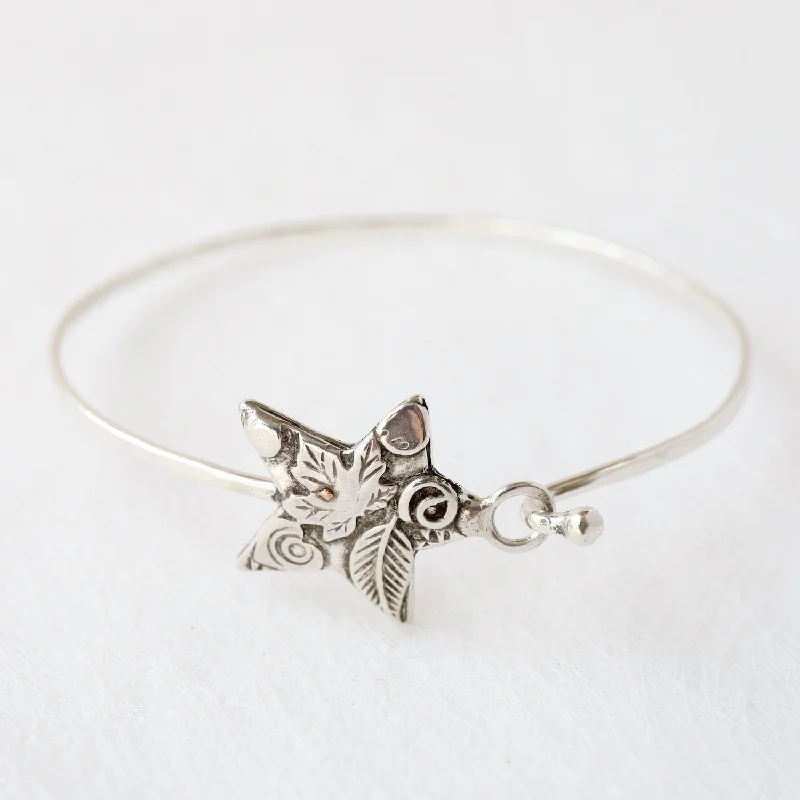 Trendy bracelets with colorful beads-Sterling Silver Bangle with Leafy Star Catch