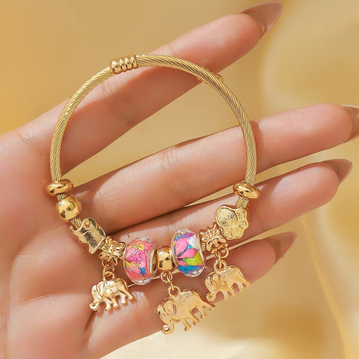 Beautiful bangles with diamond accents-Elegant Elephant Alloy Wholesale Bangle