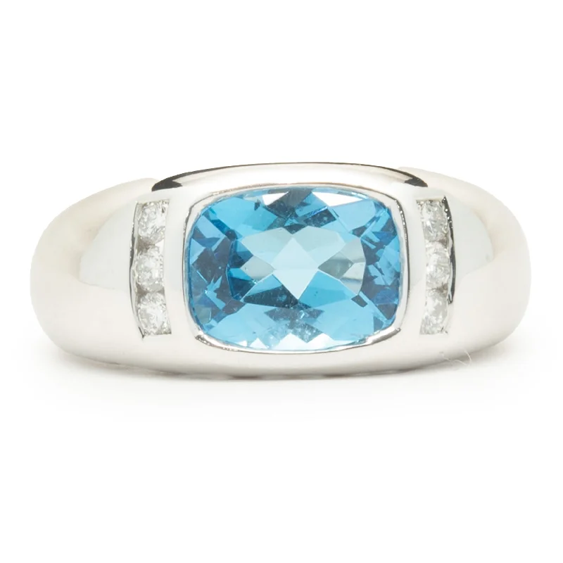 Beautiful engagement rings with blue topaz-14 Karat White Gold Blue Topaz and Diamond Ring