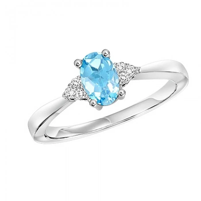 Elegant engagement rings with twisted shanks-Oval-Shaped Blue Topaz Ring with Trios of Side Diamonds