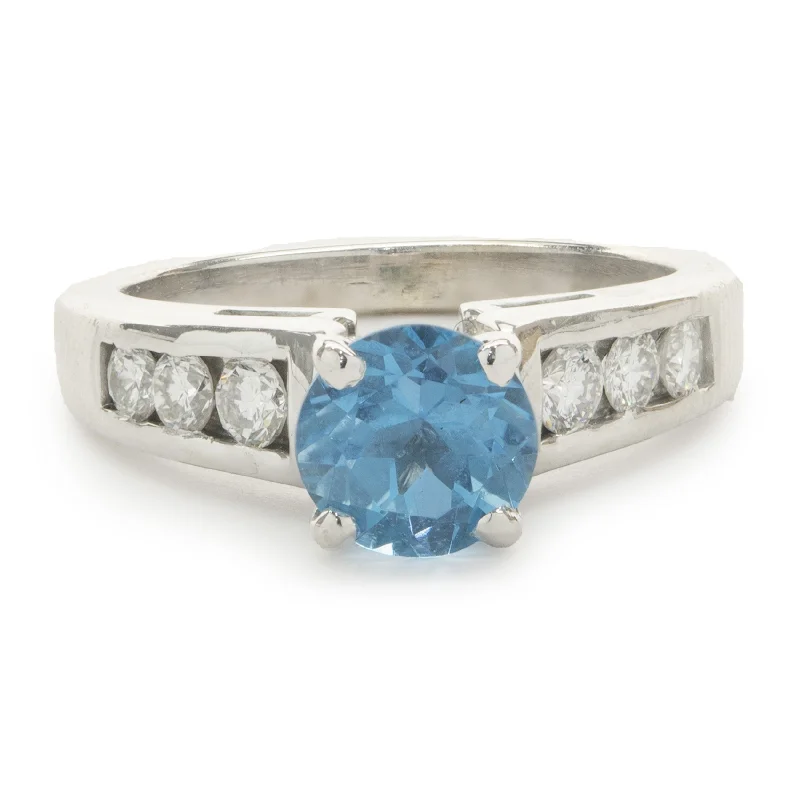 Timeless engagement rings with platinum bands-14 Karat White Gold Blue Topaz and Diamond Ring