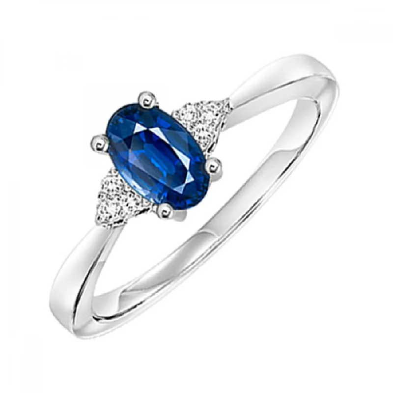 Simple engagement rings with sapphire accents-Oval-Shaped Sapphire Ring with Trios of Side Diamonds