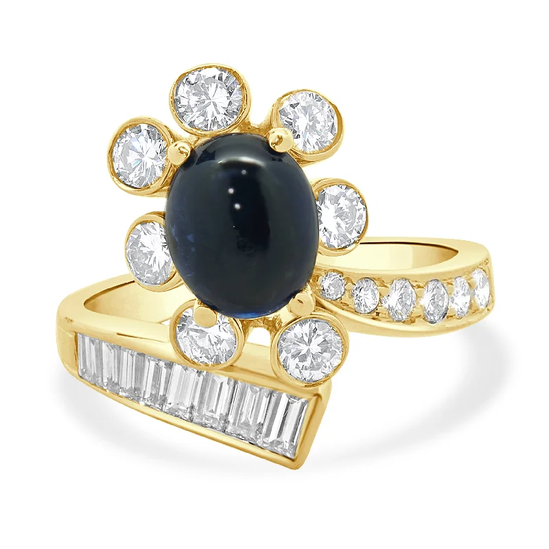 Stunning engagement rings with princess diamonds-18 Karat Yellow Gold Cabochon Cut Sapphire and Diamond Bypass Ring